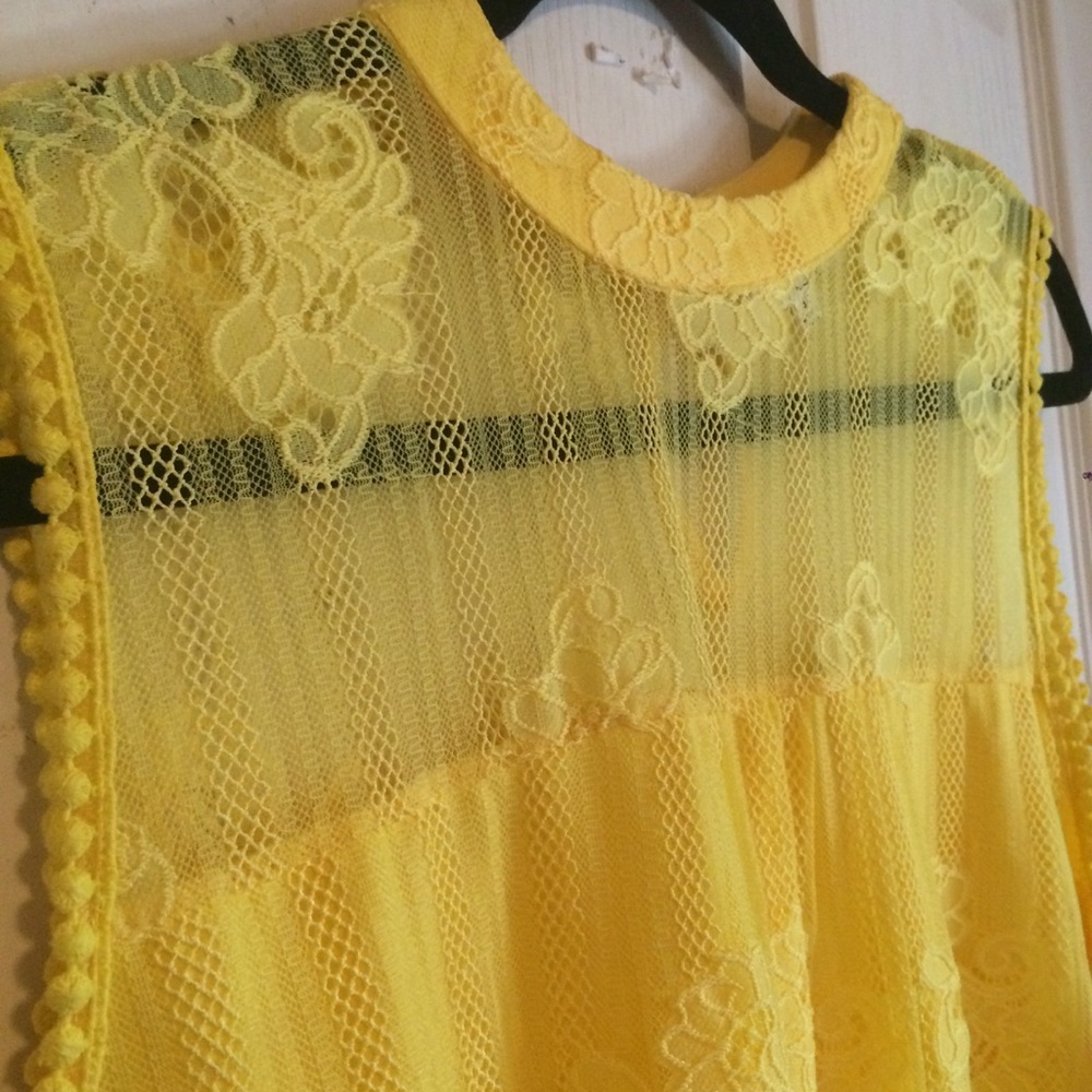 Sleeveless yellow blouse